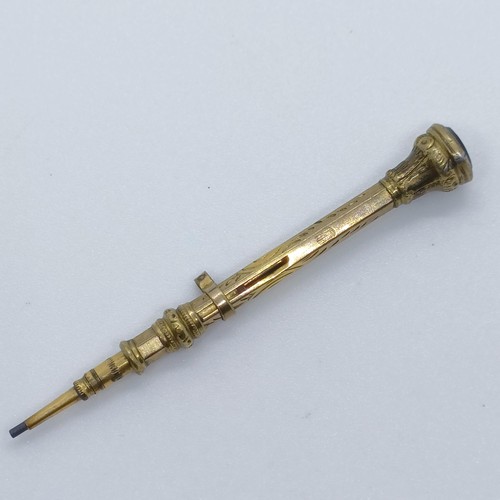 764 - A 9ct gold propelling pencil