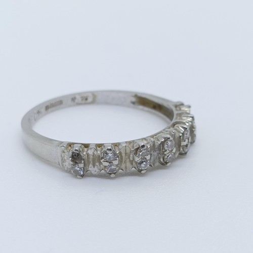 777 - An 18ct white gold and diamond ring, ring size M