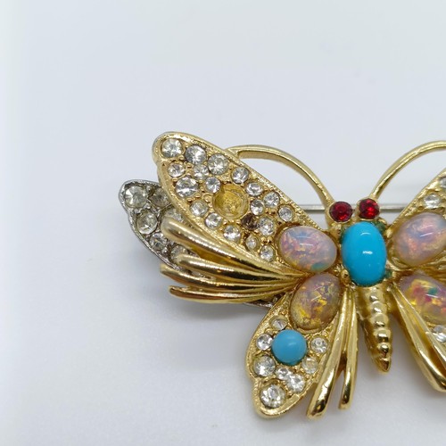 779 - A turquoise and opal butterfly pendant