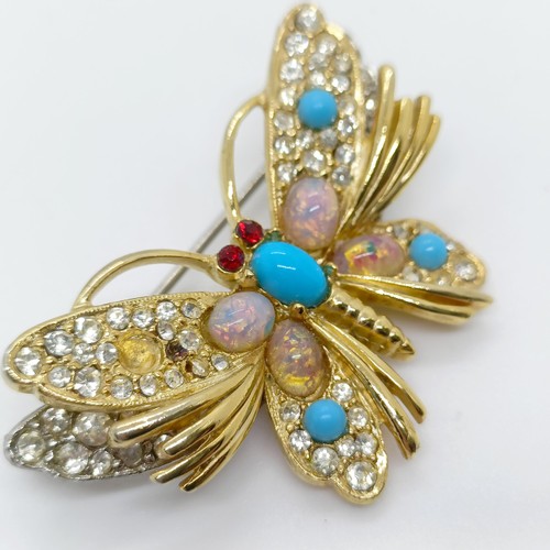 779 - A turquoise and opal butterfly pendant