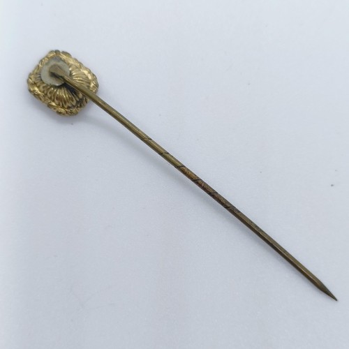 792 - A yellow coloured metal and red stone seal fob, converted to a stick pin