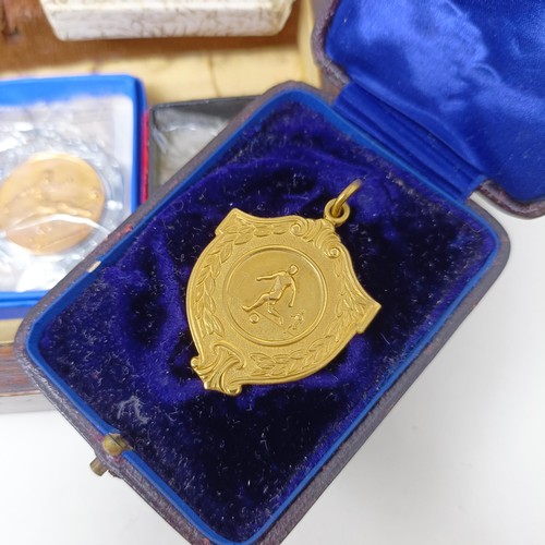 805 - A silver gilt sporting medal, cased, other medals, badges, and costume jewellery (box)