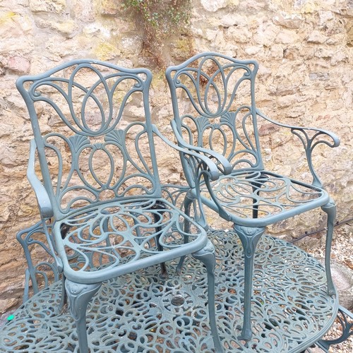 1078 - A painted metal garden table, 147 cm wide, six chairs, a folding table and an umbrella stand