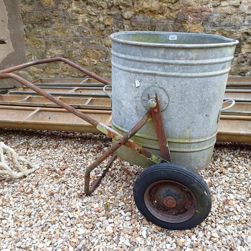 1072 - A galvanized water tank and trolley