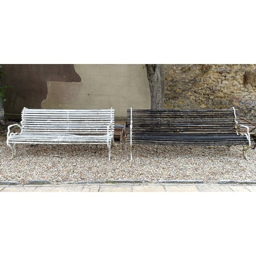 1071 - A pair of early 20th century country house garden benches, with wooden slats and painted metal crabs... 