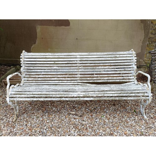 1071 - A pair of early 20th century country house garden benches, with wooden slats and painted metal crabs... 