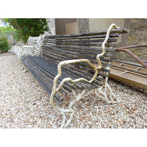 1071 - A pair of early 20th century country house garden benches, with wooden slats and painted metal crabs... 