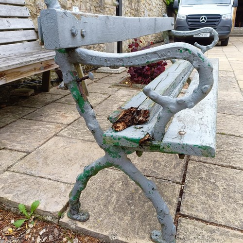 1082 - A painted garden bench, with metal crabstock ends, 180 cm wide