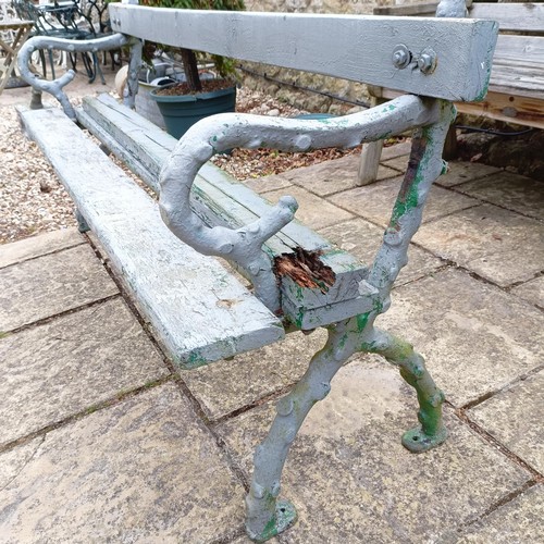 1082 - A painted garden bench, with metal crabstock ends, 180 cm wide