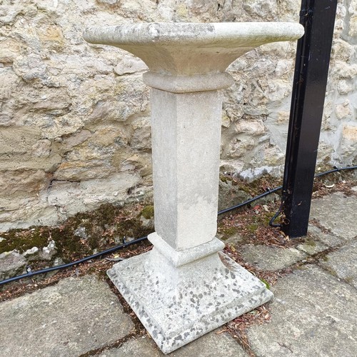 1080 - A composite stone pedestal, 81 cm high x 41 cm deep