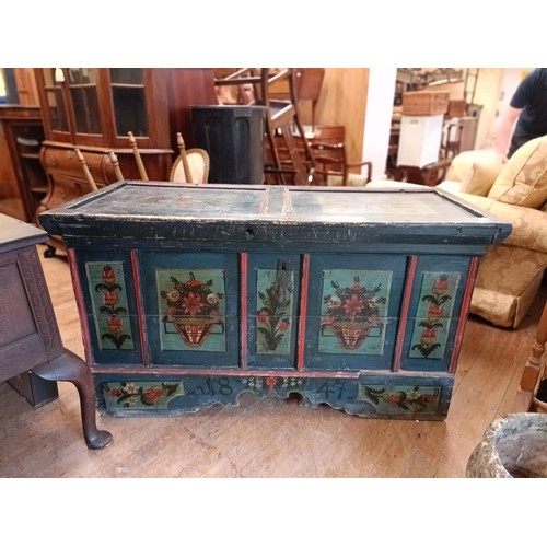 1064 - A 19th century Continental painted coffer, decorated flowers, 145 cm wide