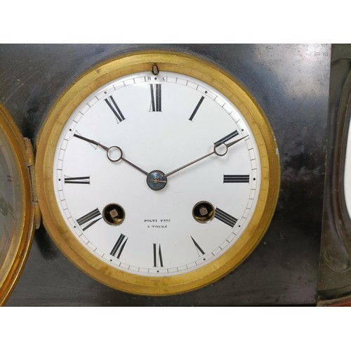 878 - A mantel clock, in a red marble and slate case, 33 cm wide, and three other clocks (4)