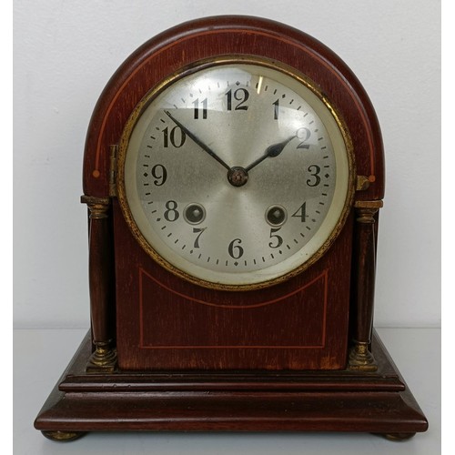 878 - A mantel clock, in a red marble and slate case, 33 cm wide, and three other clocks (4)