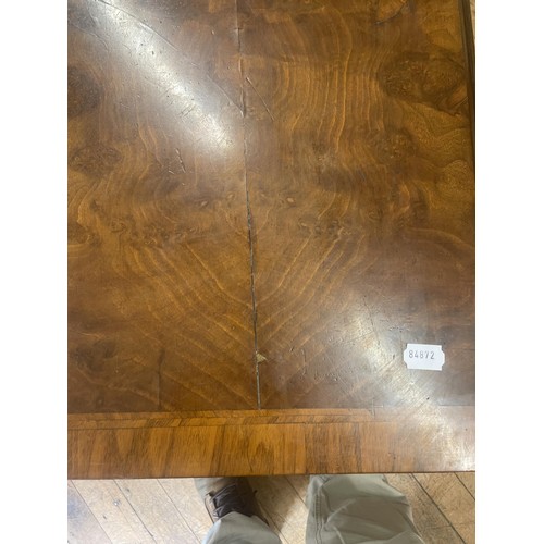 1019 - A Continental walnut sofa table, 143 cm wide