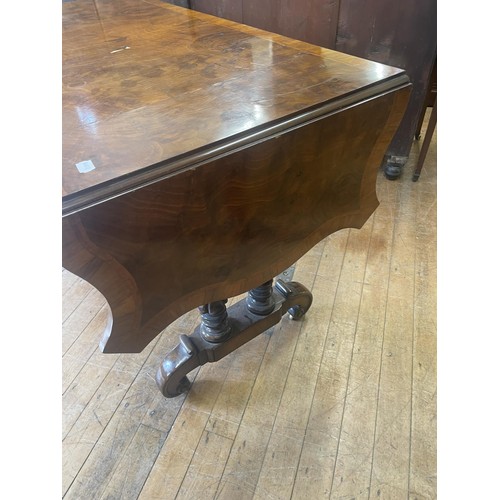 1019 - A Continental walnut sofa table, 143 cm wide