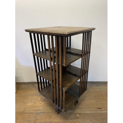 980 - An oak revolving bookcase, 50 cm wide