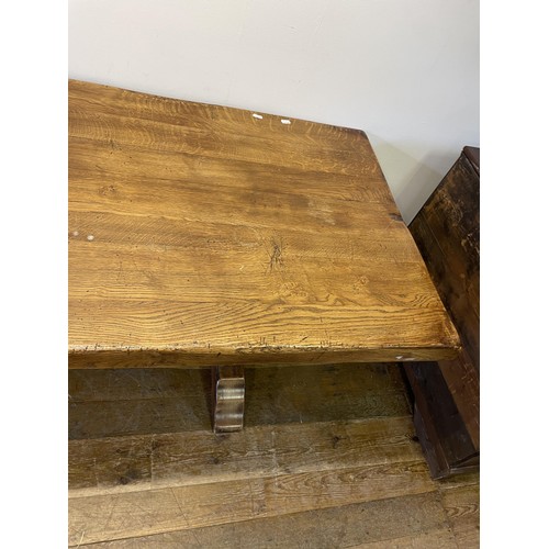 945 - An oak refectory dining table, the top 226 x 92 cm