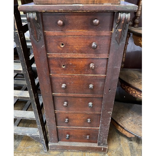 970 - A late 19th century mahogany Wellington chest, 102 x 49 cm, in need of restoration, and a corner wha... 