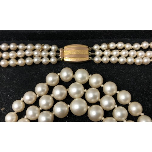 826 - A cultured pearl necklace, with a 9ct gold clasp, in a later box