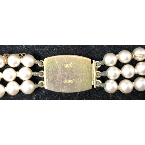 826 - A cultured pearl necklace, with a 9ct gold clasp, in a later box