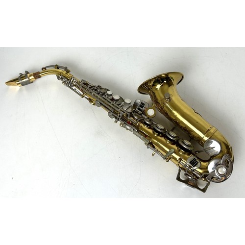 542 - A soprano saxophone, in a fitted case