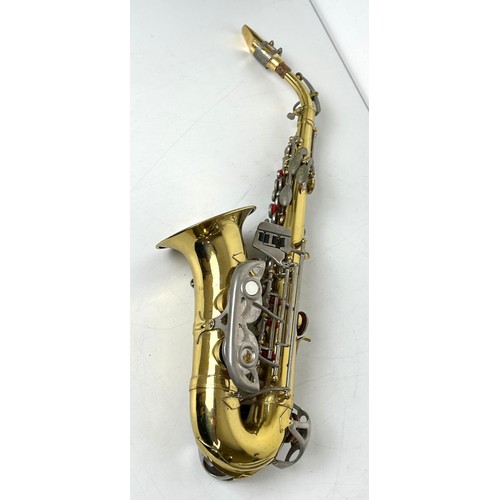 542 - A soprano saxophone, in a fitted case