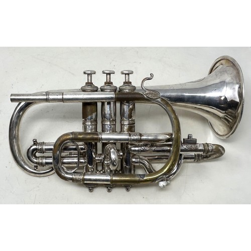 543 - An ornate cornet