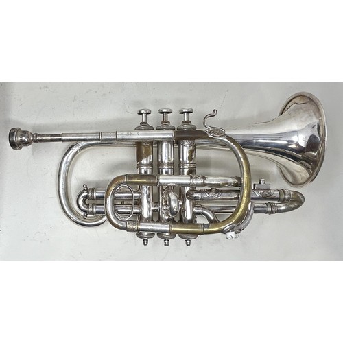 543 - An ornate cornet