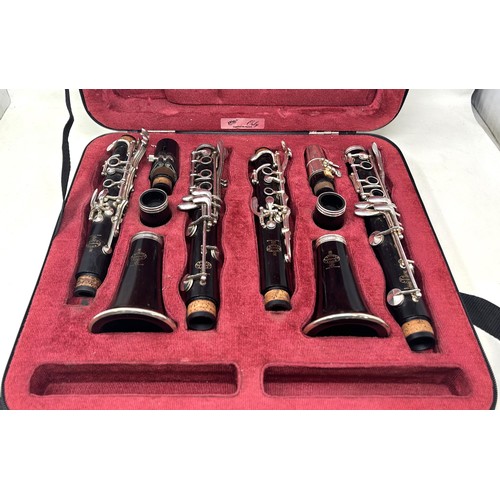 544 - A matched pair of Buffet Bb and A wooden clarinets, in a fitted case