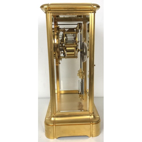 902 - A mantel clock, with an enamel dial, with a visible anchor escapement, to a twin train movement, str... 