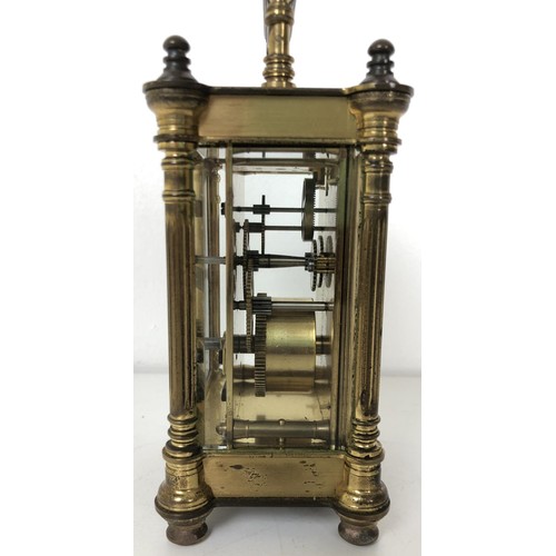 904 - A carriage clock, by Charles Frodsham, in a brass and glass case, 17 cm high