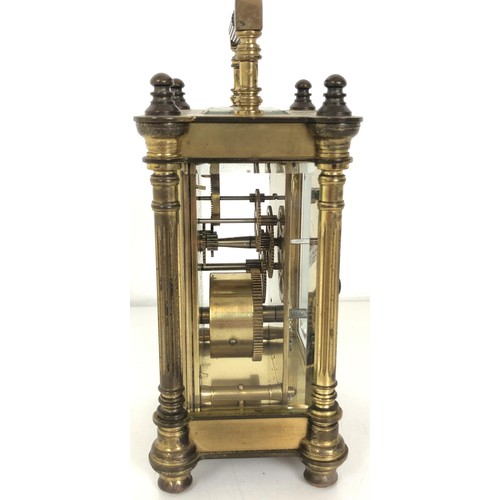 904 - A carriage clock, by Charles Frodsham, in a brass and glass case, 17 cm high