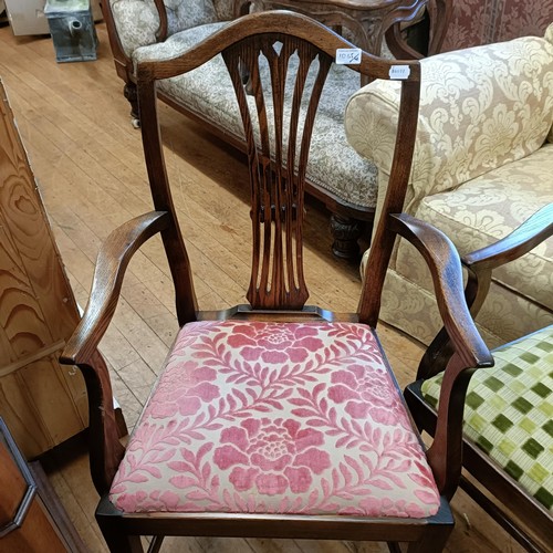 1065 - A pair of oak armchairs, a mahogany armchair (3)