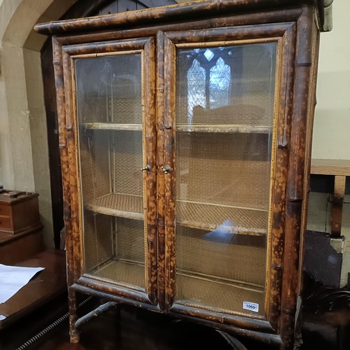 1060 - A late Victorian bamboo bookcase, and a sideboard (2)