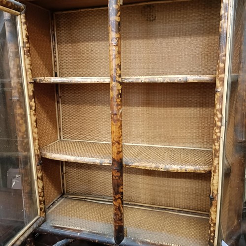 1060 - A late Victorian bamboo bookcase, and a sideboard (2)