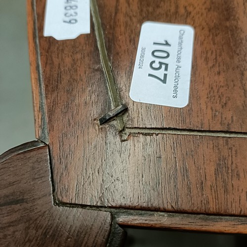 1057 - A mahogany bow front chest, having two short and three long drawers, 127 cm wide