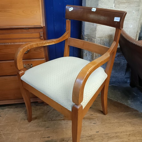 1059 - A yew wood bureau bookcase, and an armchair (2)