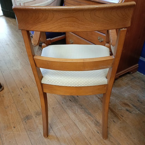 1059 - A yew wood bureau bookcase, and an armchair (2)