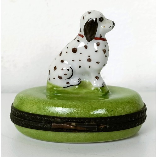 672 - A pair of Staffordshire figures of a dalmatian and a pup, 7 cm high, and assorted other Staffordshir... 