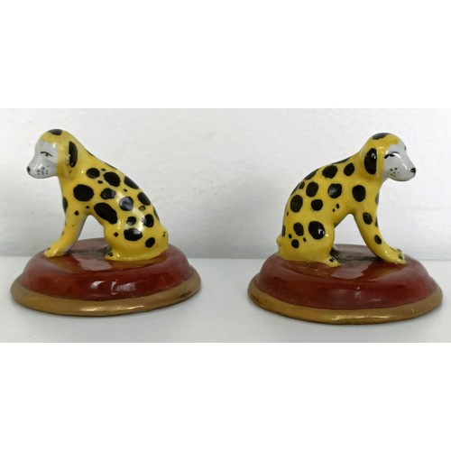 672 - A pair of Staffordshire figures of a dalmatian and a pup, 7 cm high, and assorted other Staffordshir... 