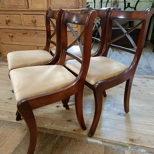 948 - A set of four chairs and a table