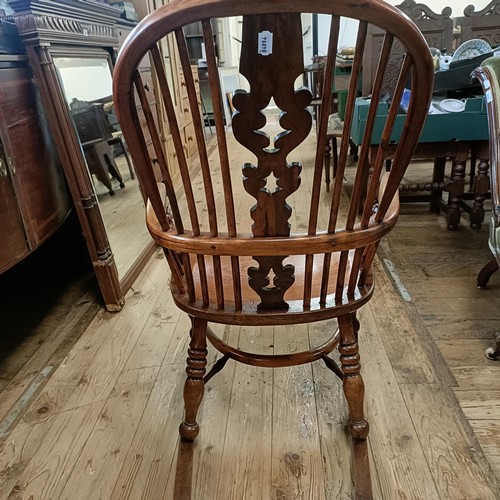 963 - A yew wood Windsor chair, converted to a rocking chair Provenance: Sold on behalf of Tenovus Cancer ... 