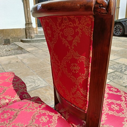 947 - A set of eight mahogany framed dining chairs with padded backs and seats