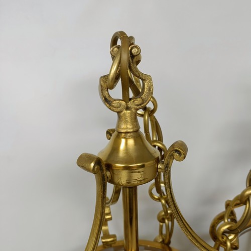 1086 - A pair of brass and glass wall lights, 50 cm high