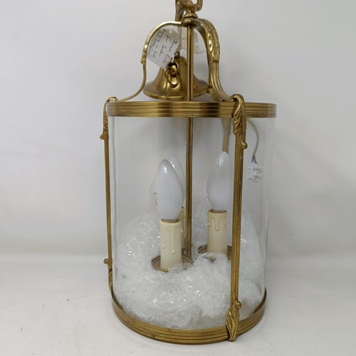 1087 - A brass and glass wall light, 44 cm high