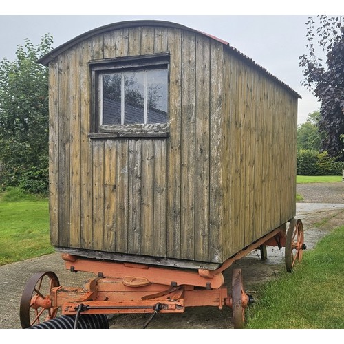 551 - A late 19th/early 20th century shepherd's hut, in largely original condition, with steps and a draw ... 