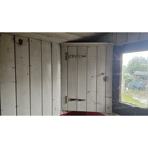 551 - A late 19th/early 20th century shepherd's hut, in largely original condition, with steps and a draw ... 