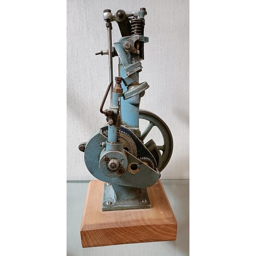 6 - A cut away model of a stationary engine, on a wooden base, 33.5 cm high (overall)