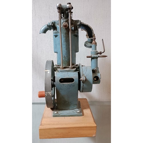 6 - A cut away model of a stationary engine, on a wooden base, 33.5 cm high (overall)