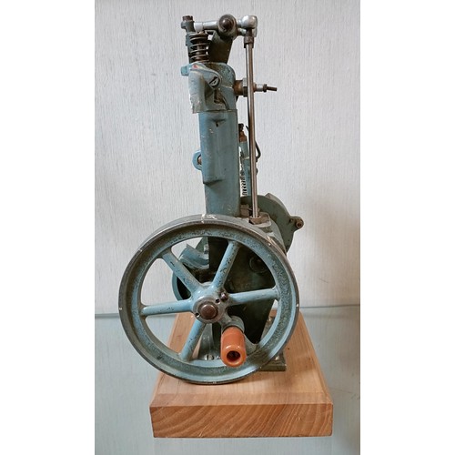 6 - A cut away model of a stationary engine, on a wooden base, 33.5 cm high (overall)